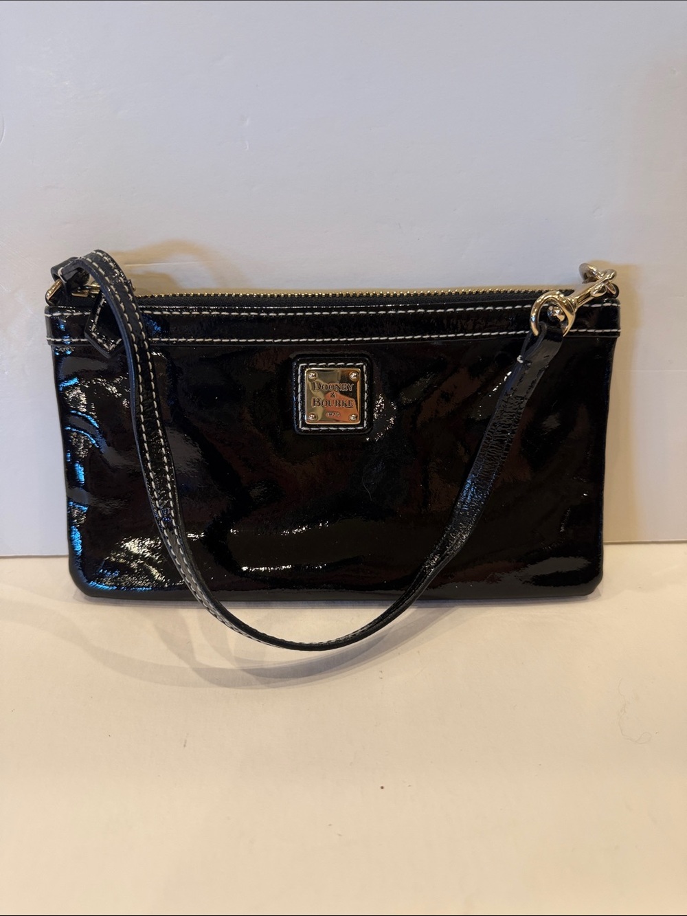 Dooney & Bourke Black Patent Wristlet Clutch with Logo Plaque